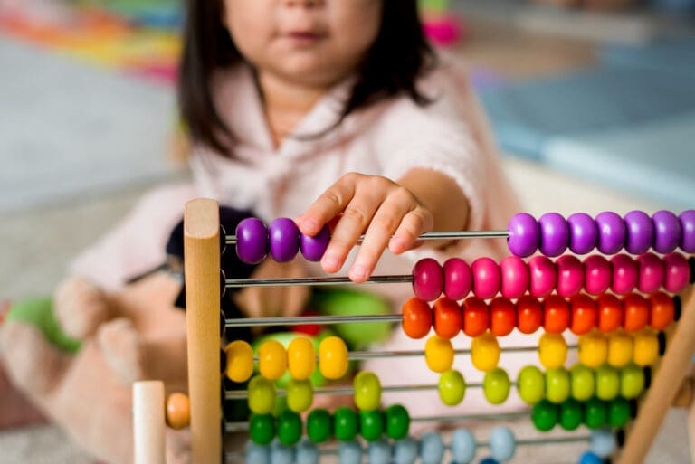little-girl-playing-abacus-counting-practice (1)